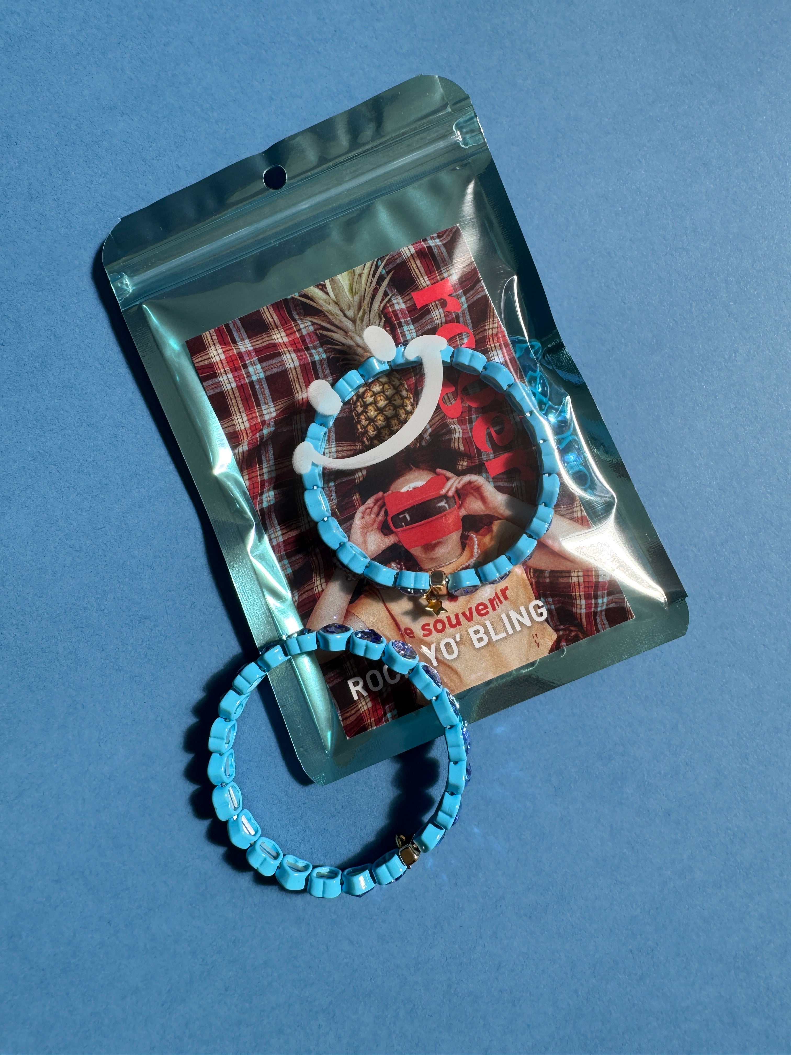 blue heart bracelet in packaging