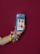 Roger Fruit Tingle sneaker charms in box