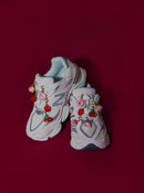 New Balance sneakers with Roger Shoe charms. Charms include; donut charm, cherry charm, strawberry charm and disco ball charm. 