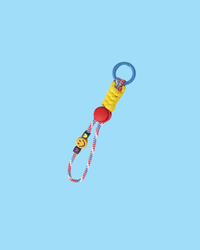 Colorful keychain with smiley face charm on a light blue background